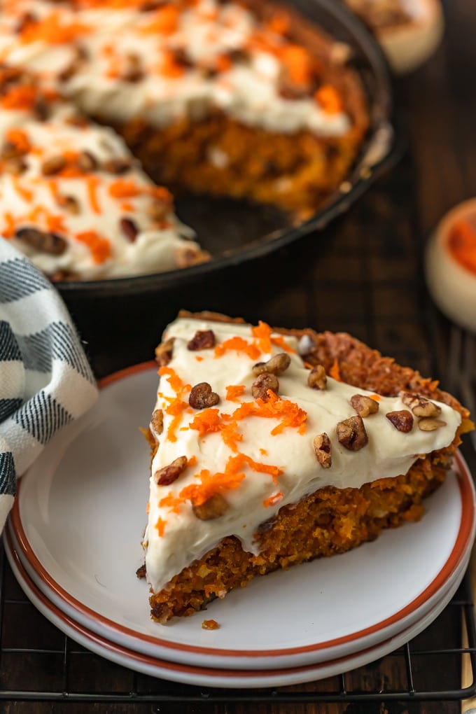 A slice of carrot cake, with the best cream cheese frosting for carrot cake