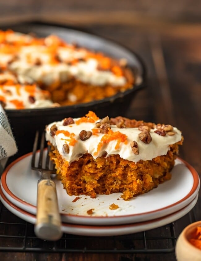 Skillet Carrot Cake is the perfect way to make this delicious dessert without an oven. This easy carrot cake recipe with pineapple is so moist, so flavorful, and so simple! And we're topping it off with the absolute best cream cheese frosting for carrot cake, because it wouldn't be complete without it!
