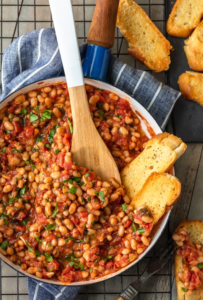 Image of A recipe for a dish made with beans and tomatoes