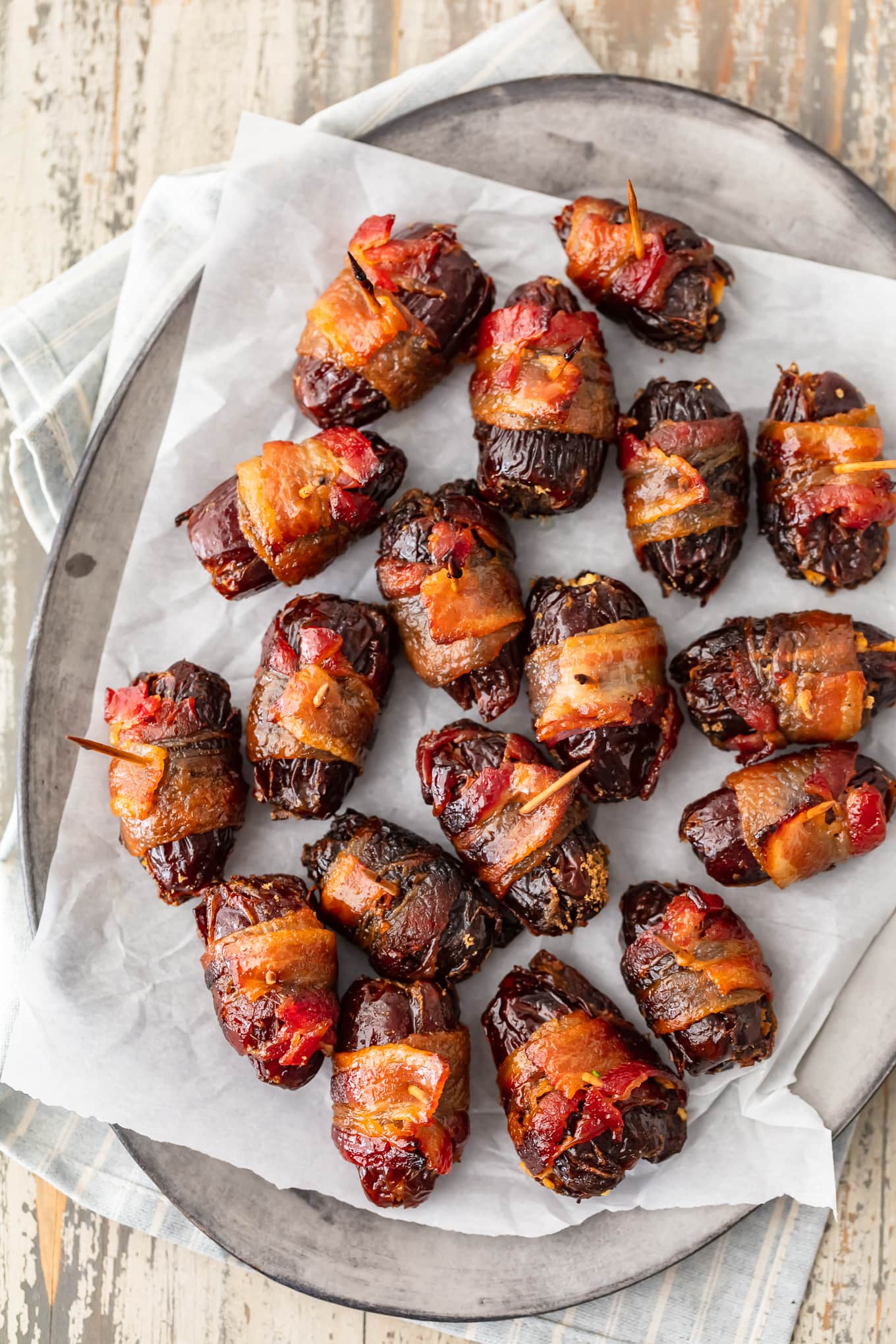 bacon wrapped dates with goat cheese and pecans