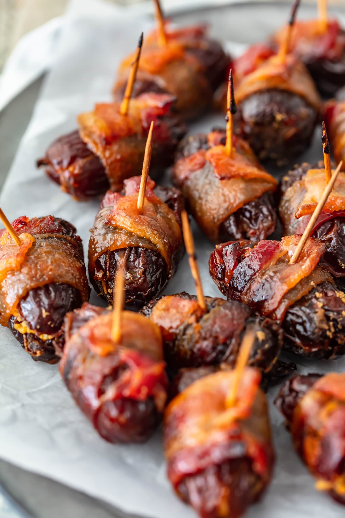 dates wrapped in bacon with a toothpick
