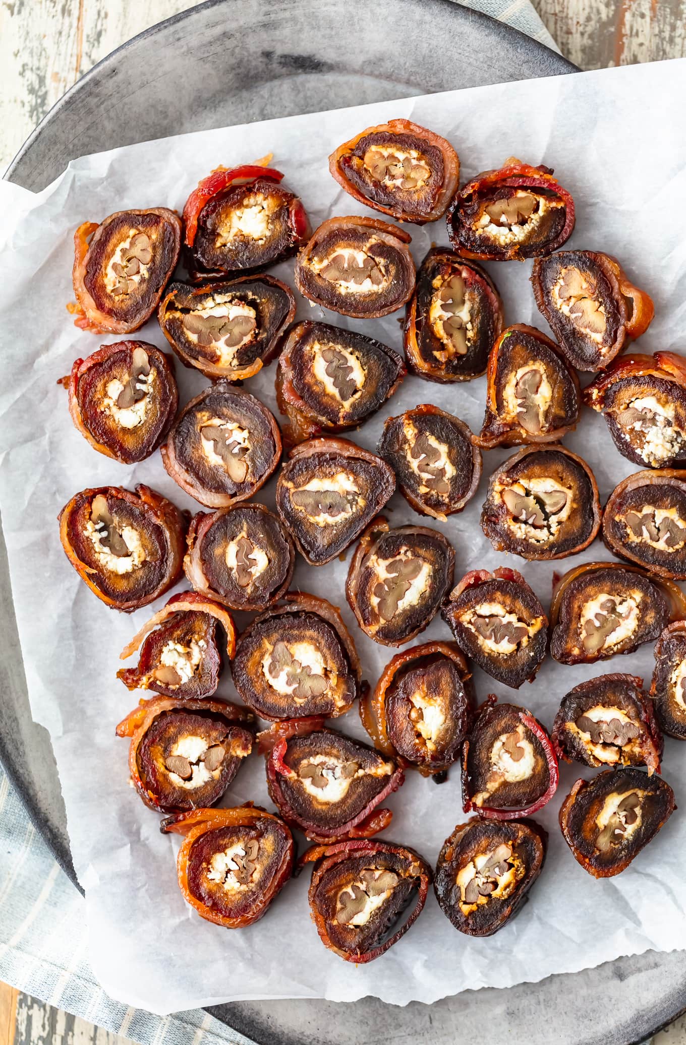 bacon wrapped dates cut into pinwheels