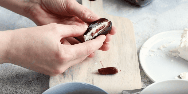 a pecan inside a stuffed date.