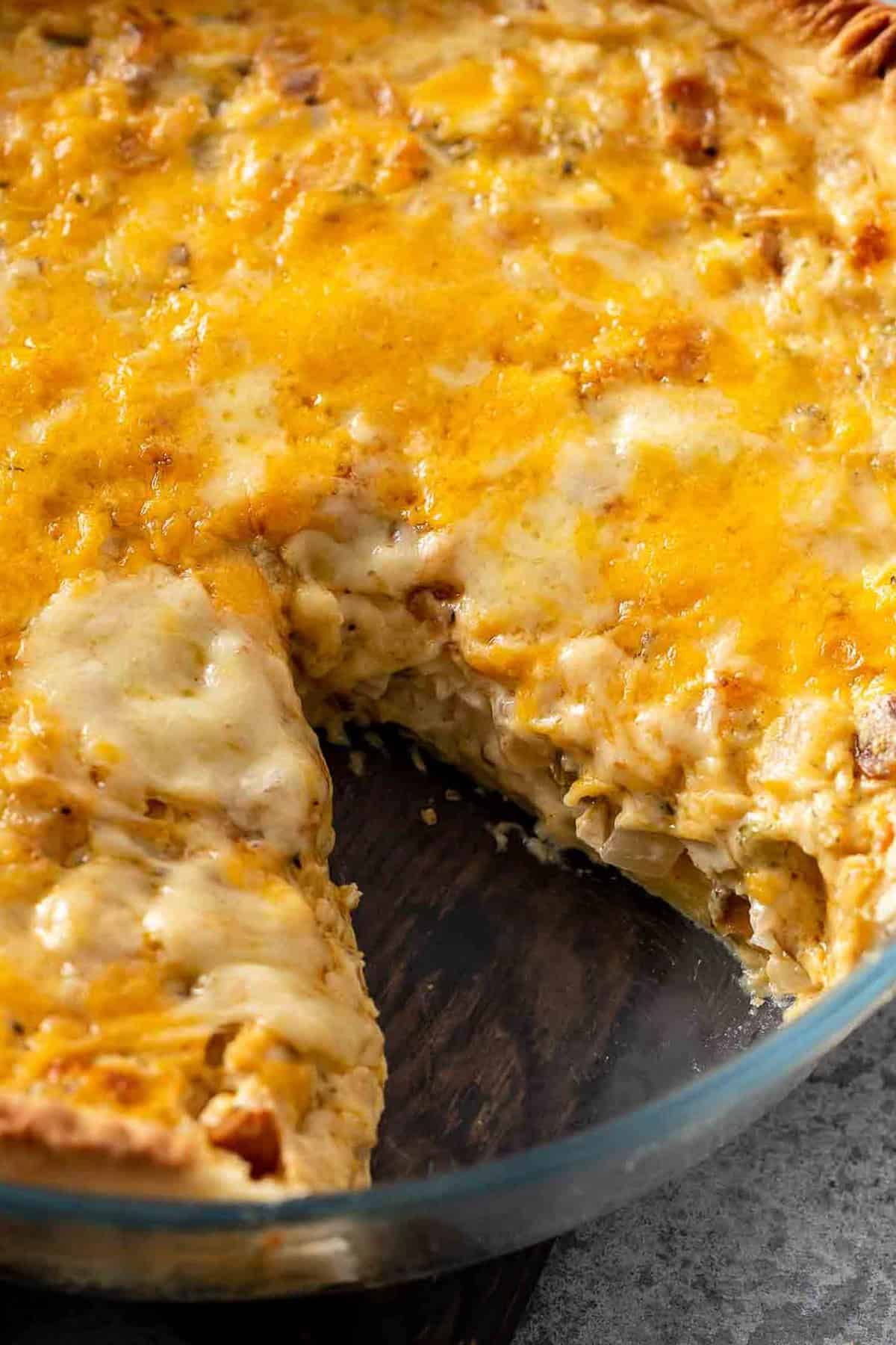 Hot Chicken Salad Pie topped with cheese