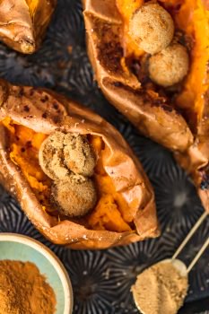 The Perfect Baked Sweet Potato is easy to achieve. So if you're wondering how to bake sweet potatoes, then you've come to the right place! Find out how long to bake sweet potatoes, plus my favorite SIMPLE way to eat them (with butter and cinnamon sugar!).