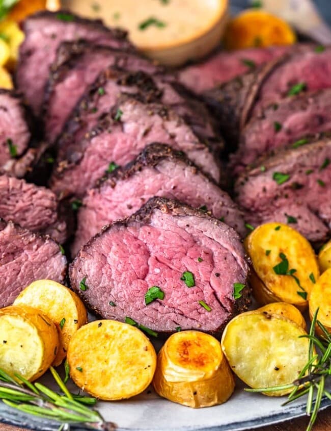 Beef Tenderloin is one of the best cuts of meat, so it deserves to be cooked right. This beef tenderloin roast is perfectly cooked and full of flavor. Learn how to cook beef tenderloin for an amazing main course dish to serve on the holidays or special occasions. This is the BEST beef tenderloin recipe, just wait and see!