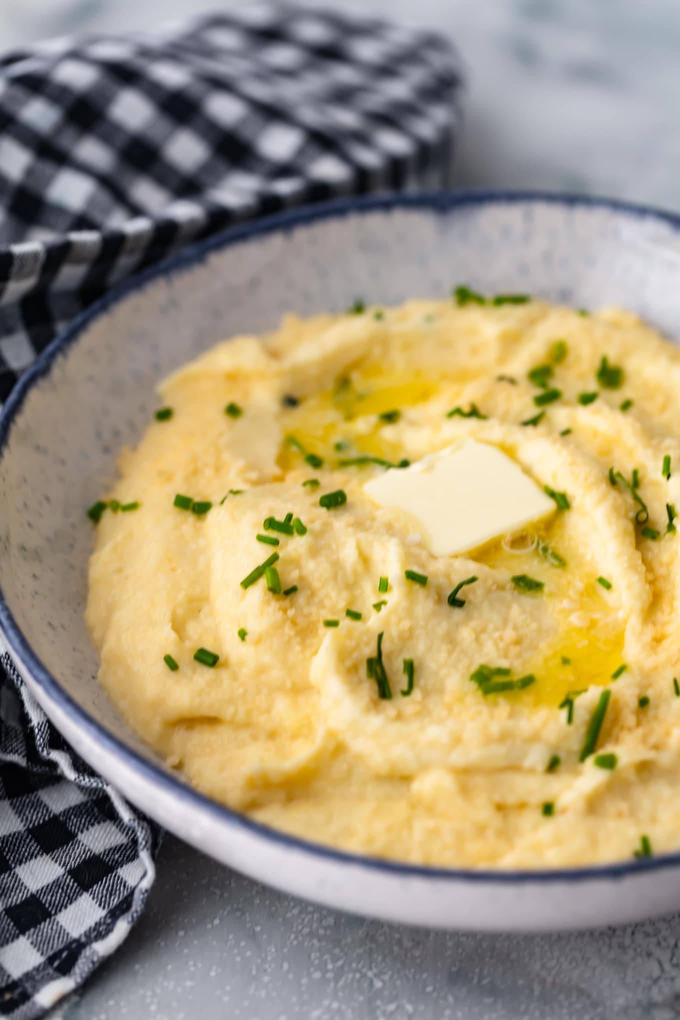 cheesy mashed cauliflower recipe in a large serving bowl