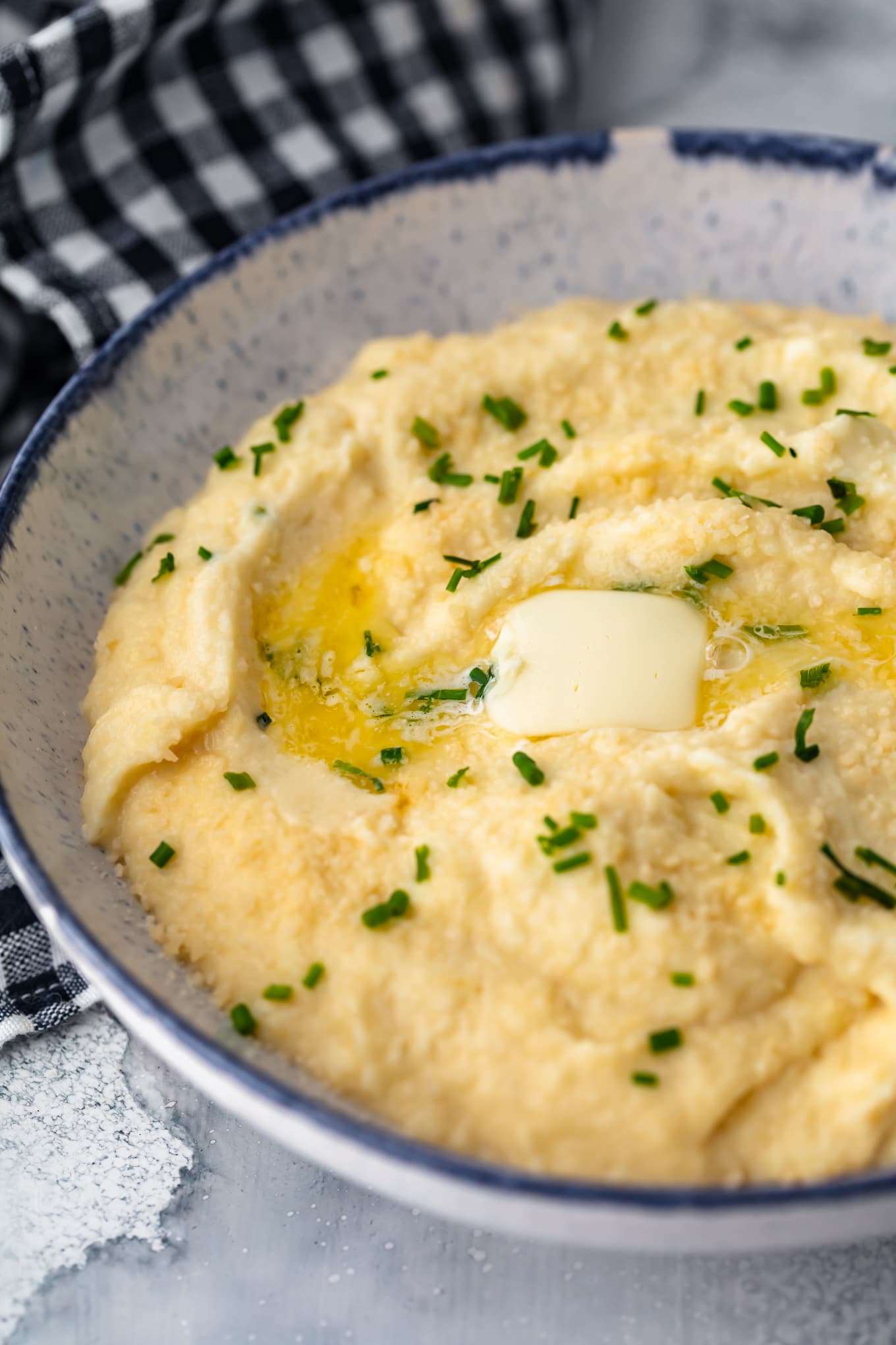 mashed cauliflower topped with butter and chives