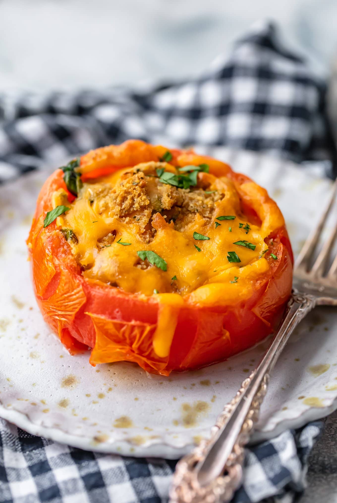 https://www.thecookierookie.com/wp-content/uploads/2018/11/cheesy-stuffed-tomatoes-recipe-9-of-11.jpg