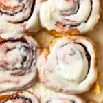 Pumpkin Cinnamon Rolls are the perfect holiday breakfast recipe for fall! It's super easy to make cinnamon rolls from scratch with this recipe. I love these for Thanksgiving, Christmas, or any weekend morning that calls for a special breakfast. And of course they're amazing for dessert too!