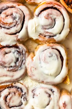 Pumpkin Cinnamon Rolls are the perfect holiday breakfast recipe for fall! It's super easy to make cinnamon rolls from scratch with this recipe. I love these for Thanksgiving, Christmas, or any weekend morning that calls for a special breakfast. And of course they're amazing for dessert too!