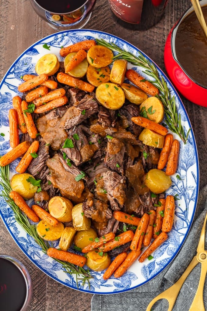 red wine pot roast served with carrots and potatoes