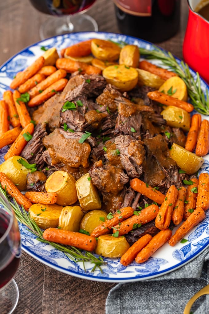 red wine pot roast served with carrots and potatoes
