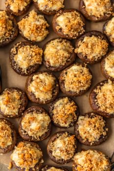 Sausage Stuffed Mushrooms are cheesy, savory, and so delicious! This easy, cheesy sausage stuffed mushroom recipe is the perfect appetizer for holidays, game day, or any special occasion. Mushroom caps are stuffed full of cheese, sausage, onion, and more to create the most amazing flavor!