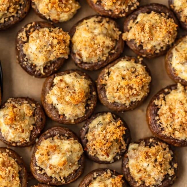 Sausage Stuffed Mushrooms are cheesy, savory, and so delicious! This easy, cheesy sausage stuffed mushroom recipe is the perfect appetizer for holidays, game day, or any special occasion. Mushroom caps are stuffed full of cheese, sausage, onion, and more to create the most amazing flavor!