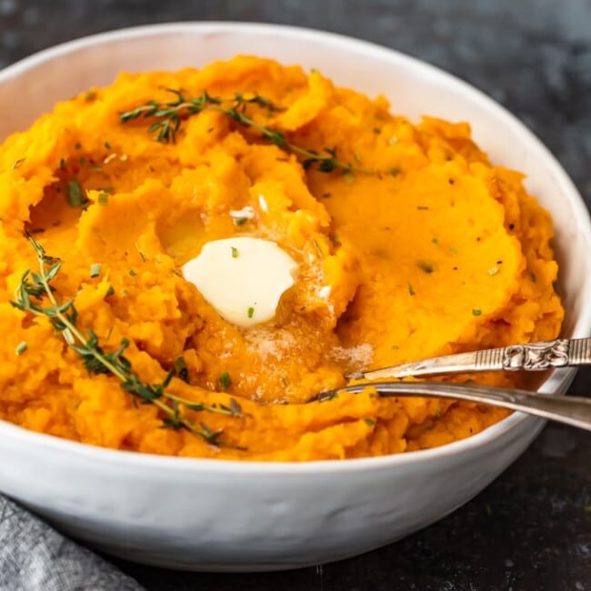 Savory Mashed Sweet Potatoes are the perfect easy side dish for Thanksgiving and beyond. This sweet potato mash recipe is so creamy and delicious! Find out how to make mashed sweet potatoes with this easy mashed sweet potatoes recipe, and add them to your holiday table.