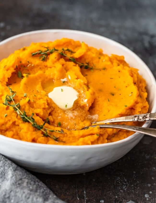Savory Mashed Sweet Potatoes are the perfect easy side dish for Thanksgiving and beyond. This sweet potato mash recipe is so creamy and delicious! Find out how to make mashed sweet potatoes with this easy mashed sweet potatoes recipe, and add them to your holiday table.