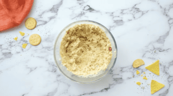 a soft cheese mixture in a glass bowl.