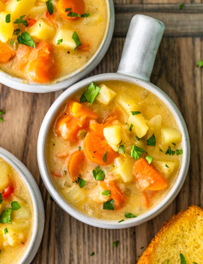 Cheesy Potato Soup is filled with hearty vegetables, potatoes, and lots of cheese! This cheesy potato chowder is a great soup to chow down on during cold winter nights. It's warm, it's easy to make, and it's so delicious. This cheesy potato soup recipe is perfect!