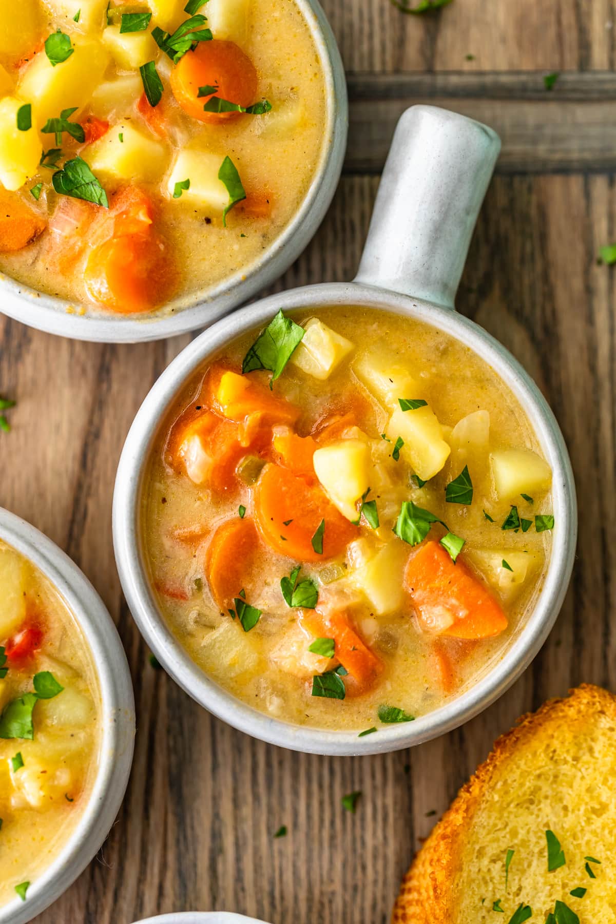 cheesy potato soup recipe in white bowls