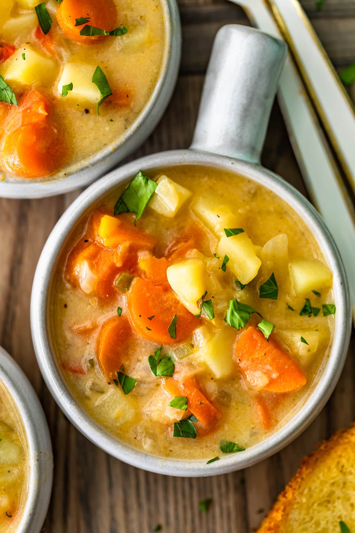 close up on a bowl of cheesy potato chowder