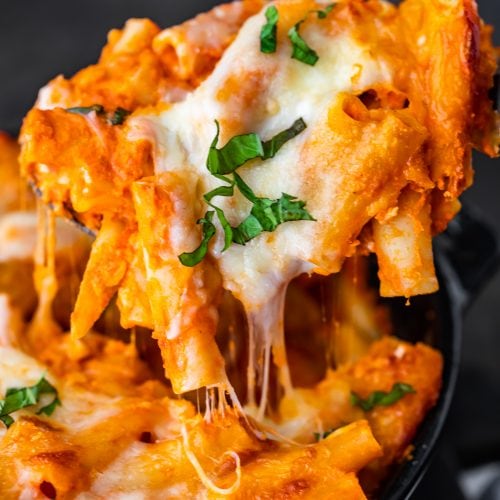 Baked Ziti is a simple and delicious baked pasta dish that never fails to please. This easy baked ziti recipe is extra creamy and cheesy! Everything bakes together into something so tasty...the best baked ziti recipe ever!