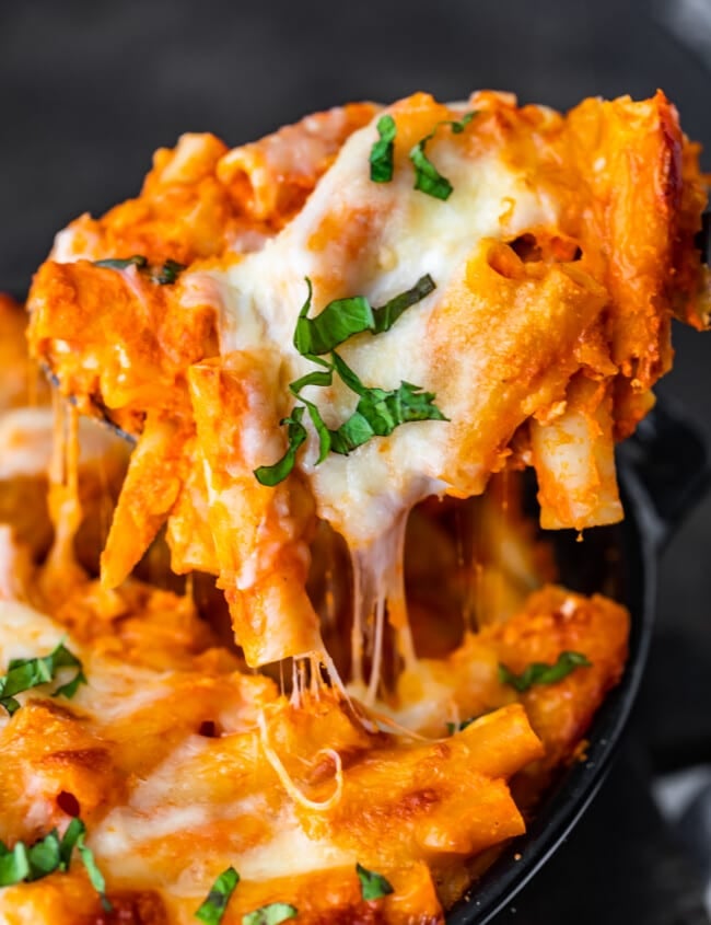 Baked Ziti is a simple and delicious baked pasta dish that never fails to please. This easy baked ziti recipe is extra creamy and cheesy! Everything bakes together into something so tasty...the best baked ziti recipe ever!