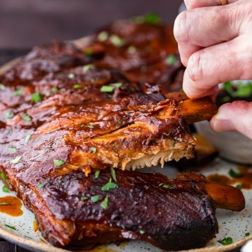 Crock Pot Ribs are an easy way to make the most delicious ribs for any occasion. This slow cooker ribs recipe is so simple! You can cook these crock pot BBQ ribs stress-free, and they'll come out super tender and flavorful.