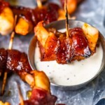 Bacon Wrapped Shrimp is an easy appetizer perfect for New Year's Eve, game day, Christmas, or any other holiday. What could be better than shrimp wrapped in bacon?! This simple shrimp appetizer has a bit of a sweet and spicy mix for the best flavor. You're going to love this bacon wrapped shrimp recipe!