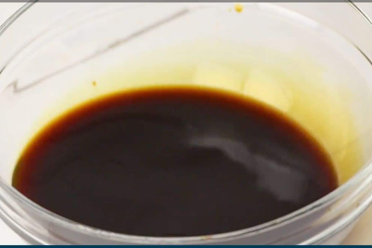 water and molasses mixed in a glass bowl