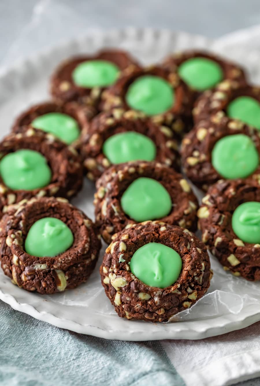a plate of mint chocolate thumbprint cookies