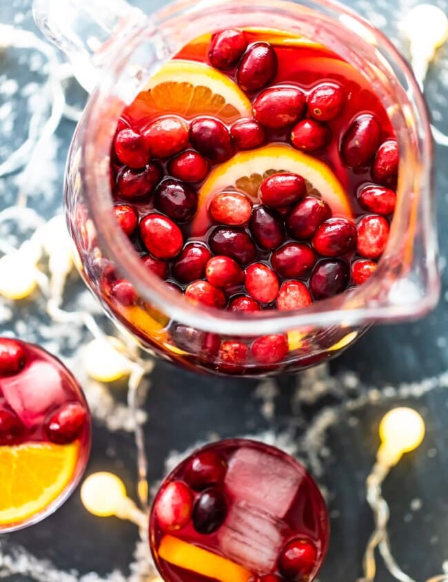 Orange Cranberry Sangria is fresh, fun, and festive. This Christmas Sangria recipe is just perfect for the holiday season!