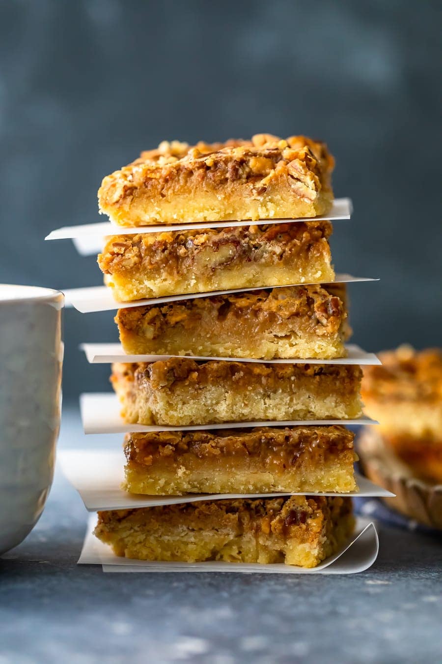 pecan pie bars stacked on top of each other