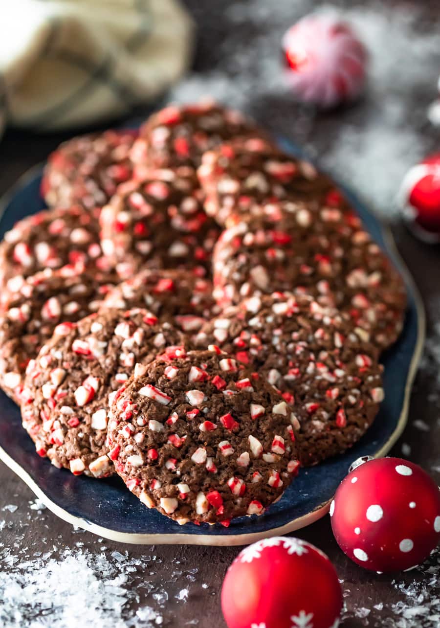 peppermint chocolate crinkle cookies arranged on a serving plate