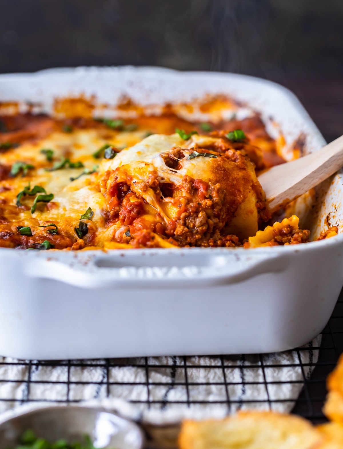 ravioli lasagna in a white casserole dish
