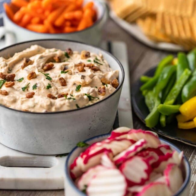 Blue Cheese Dip is the perfect veggie dip for parties, holidays, and game day. This yogurt and cream cheese dip recipe is smoky, cheesy, and full of flavor. You need this cold dip recipe for crackers, veggies, and more. It's easy to make and super tasty!
