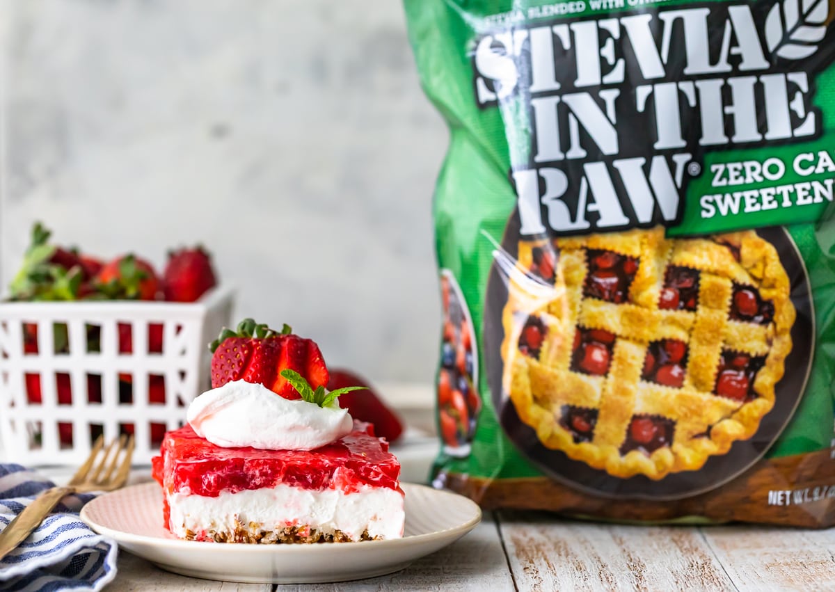 Strawberry Pretzel Salad is an absolute must make during the holidays, especially when you can make it SUGAR FREE but just as delicious as the traditional version! This Sugar Free Strawberry Pretzel Salad recipe is made with layers of salty and buttery pretzels, low fat cream cheese/whipped cream, and of course and tangy strawberry jello topping. It's a delicious side dish or even dessert for Christmas, Easter, Thanksgiving, and beyond!