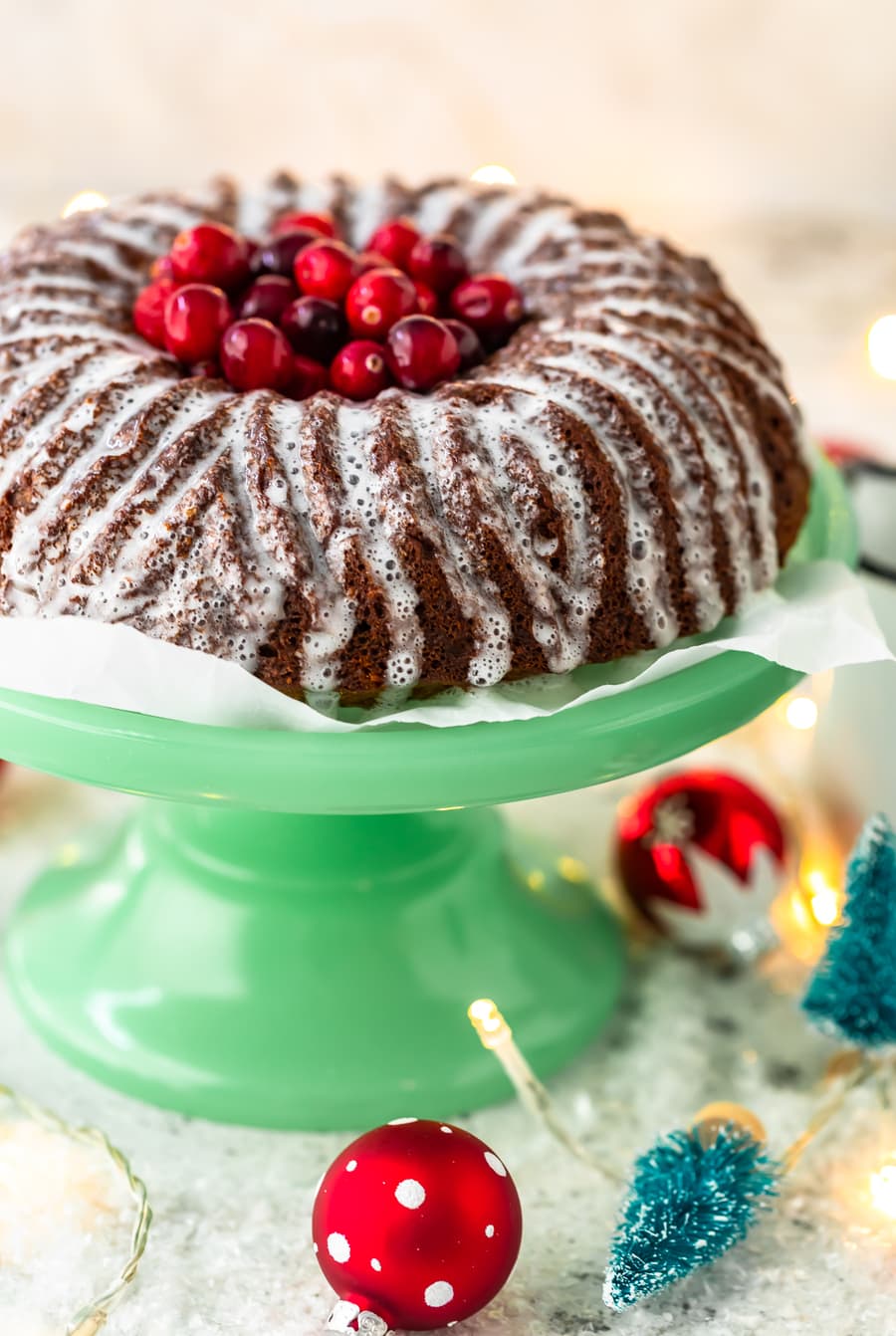 gingerbread cake with lemon glaze, topped with fresh cranberries