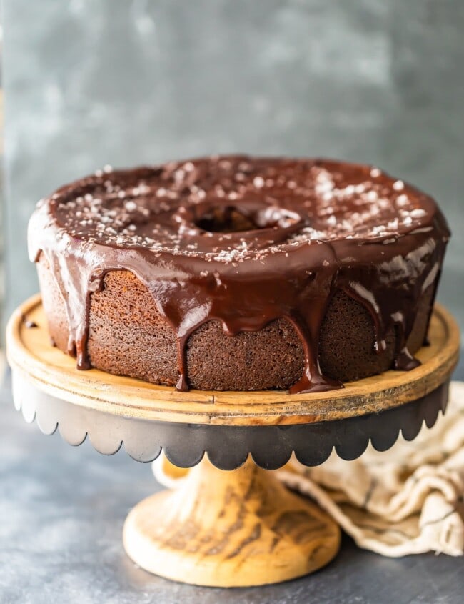 Velvet Chocolate Cake with Chocolate Ganache Icing is EVERYTHING I need for a Christmas dessert! This moist and amazing Chocolate Cake Recipe is velvety smooth, virtually fool proof, and sure to please everyone at your holiday party. This Chocolate Bundt Cake is my very favorite chocolate cake on the planet!