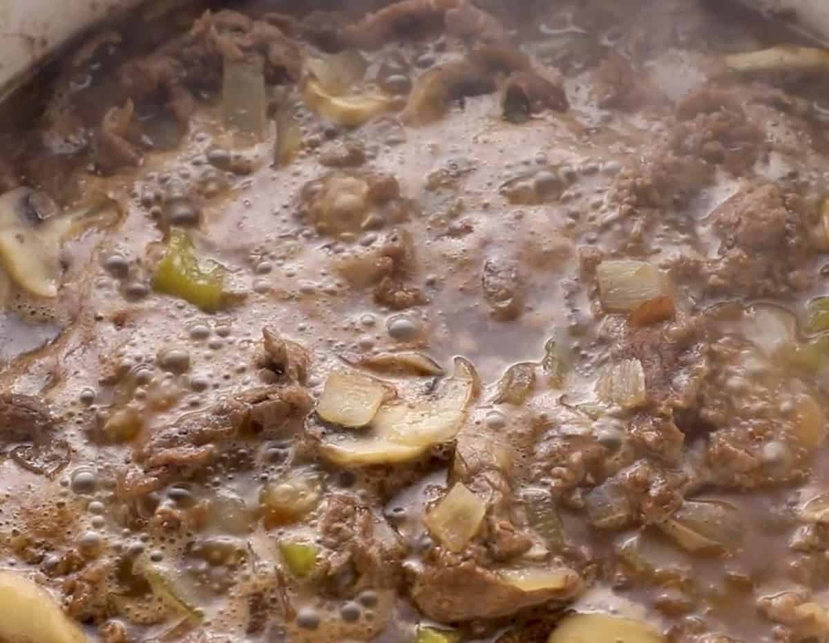 Soup simmering in the pot.