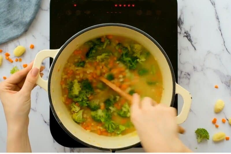 add blanched broccoli and stir