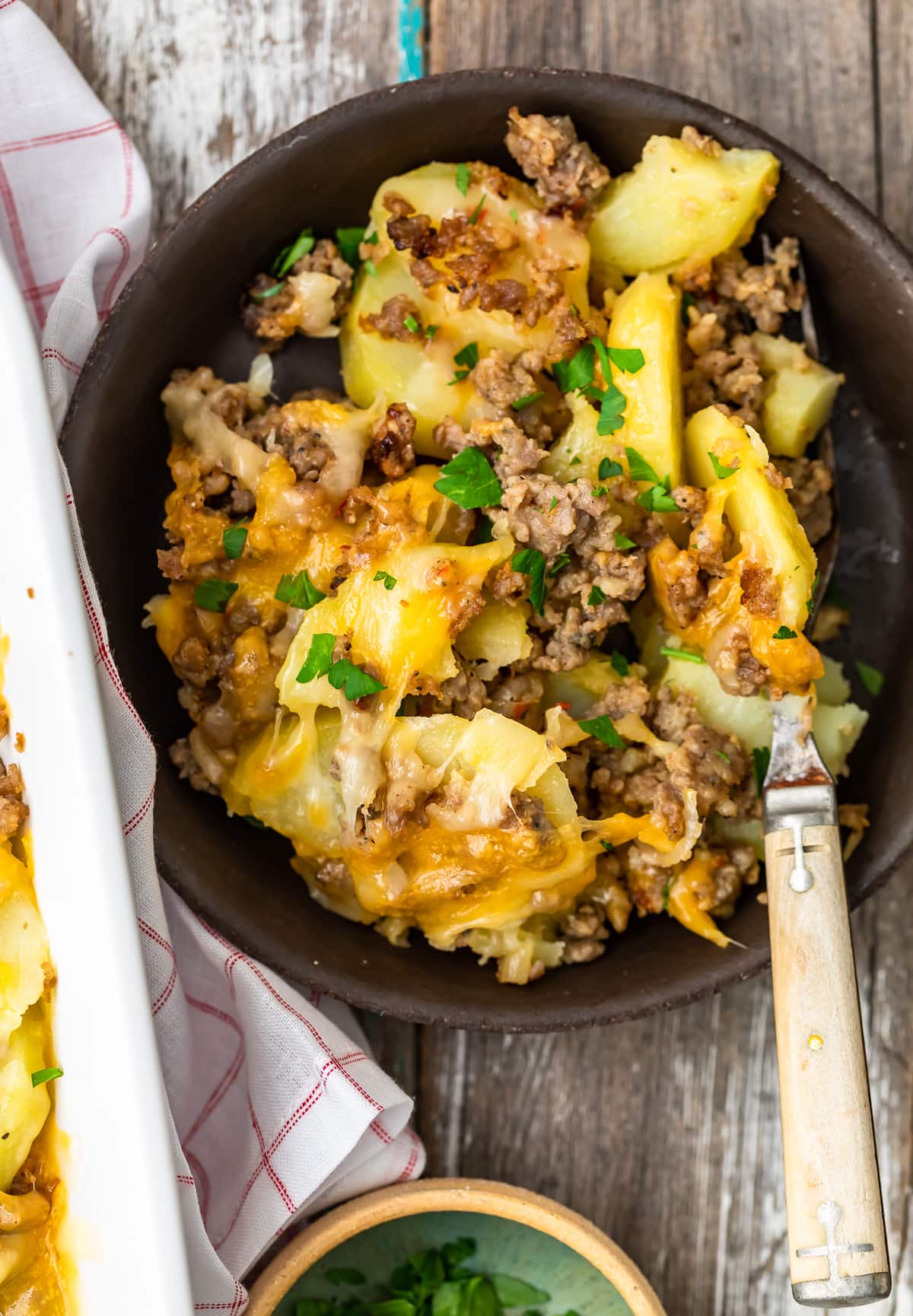 a bowl of sausage and potato bake