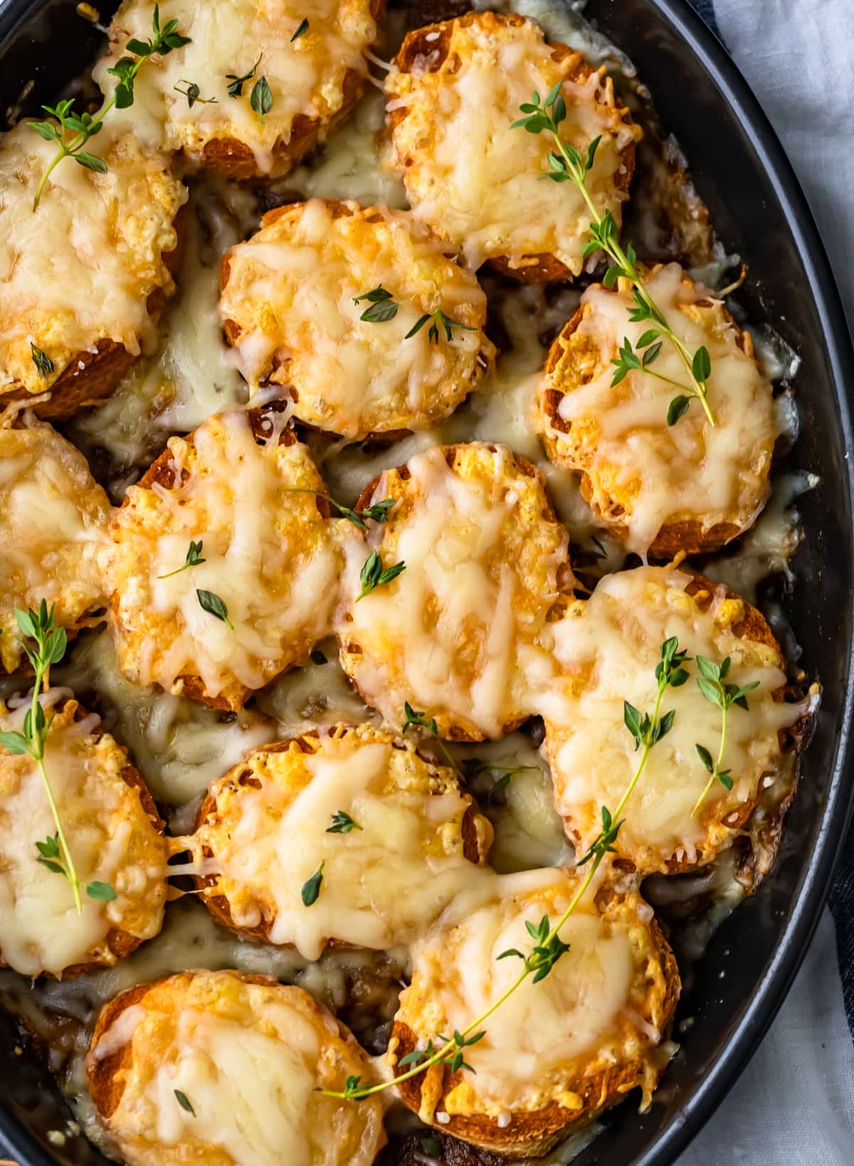 baguette slices topped with caramelized onions and cheese