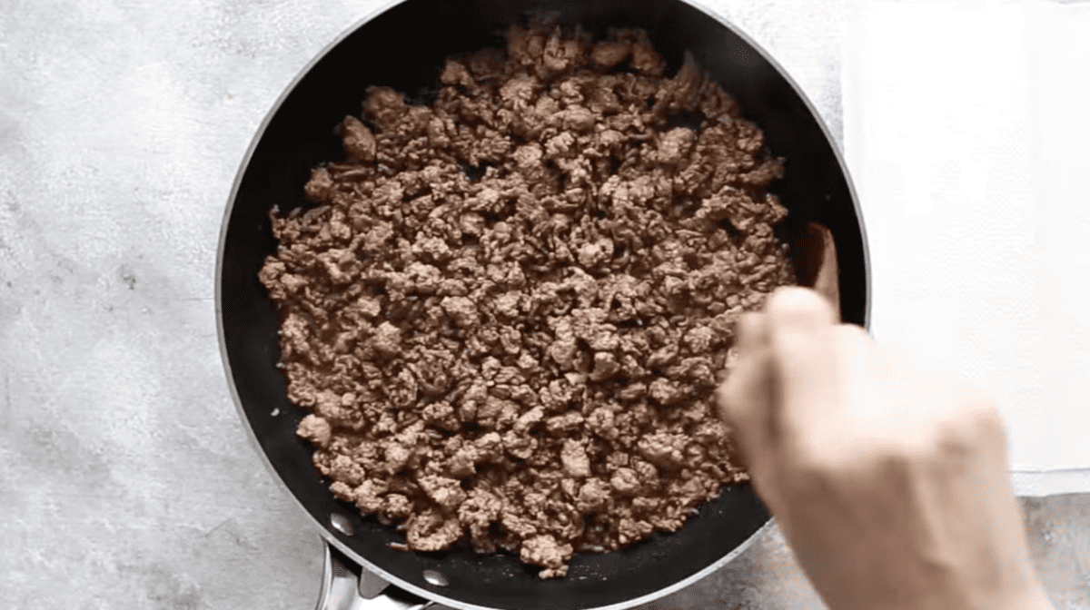 Brown rice in a frying pan.