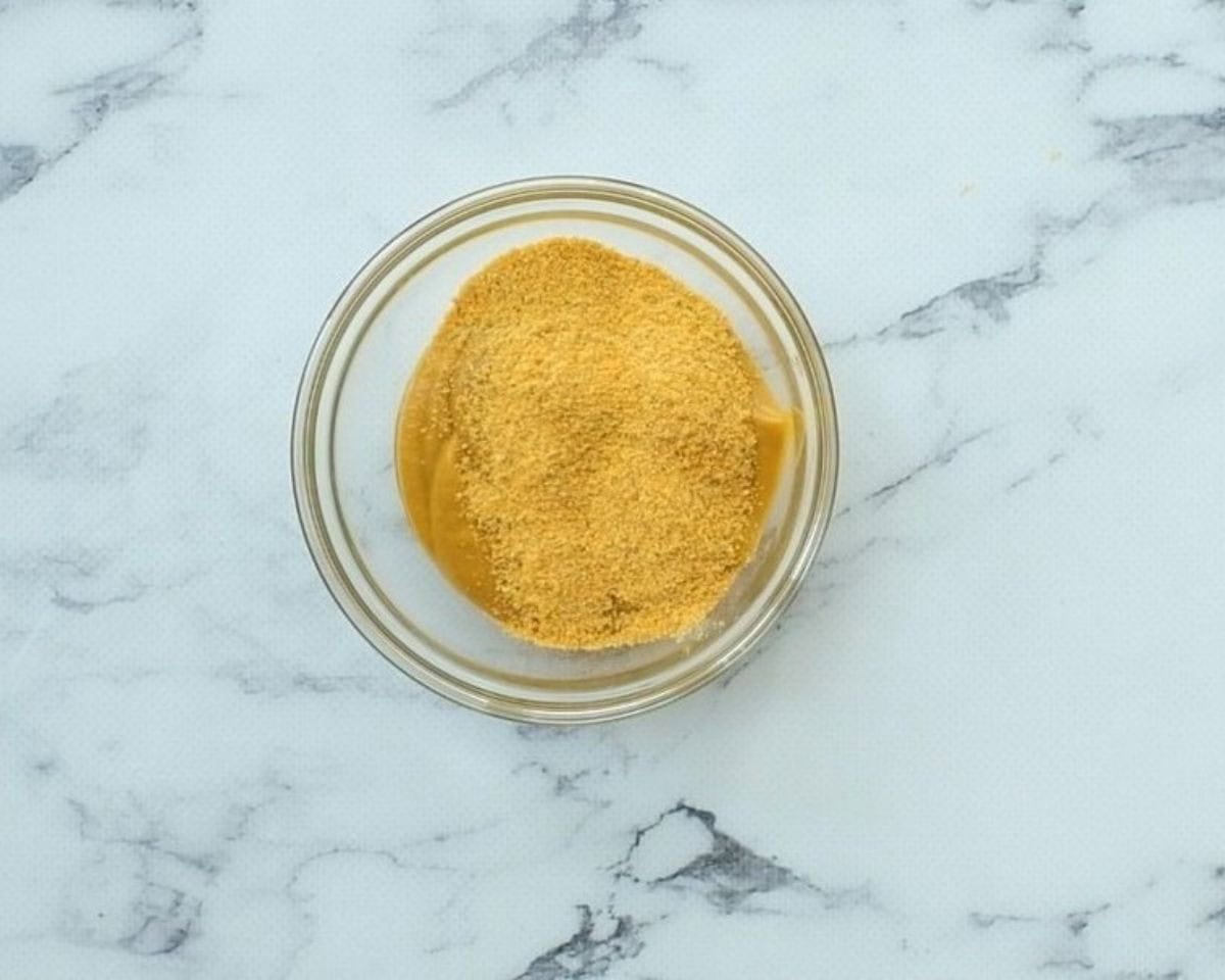 Honey Dijon mustard and dry mustard in a glass bowl.