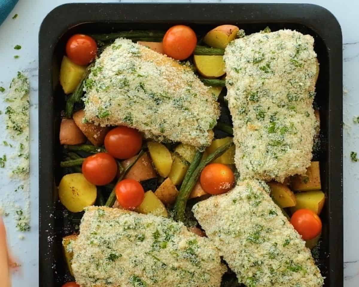 Salmon and veggies on a sheet pan.