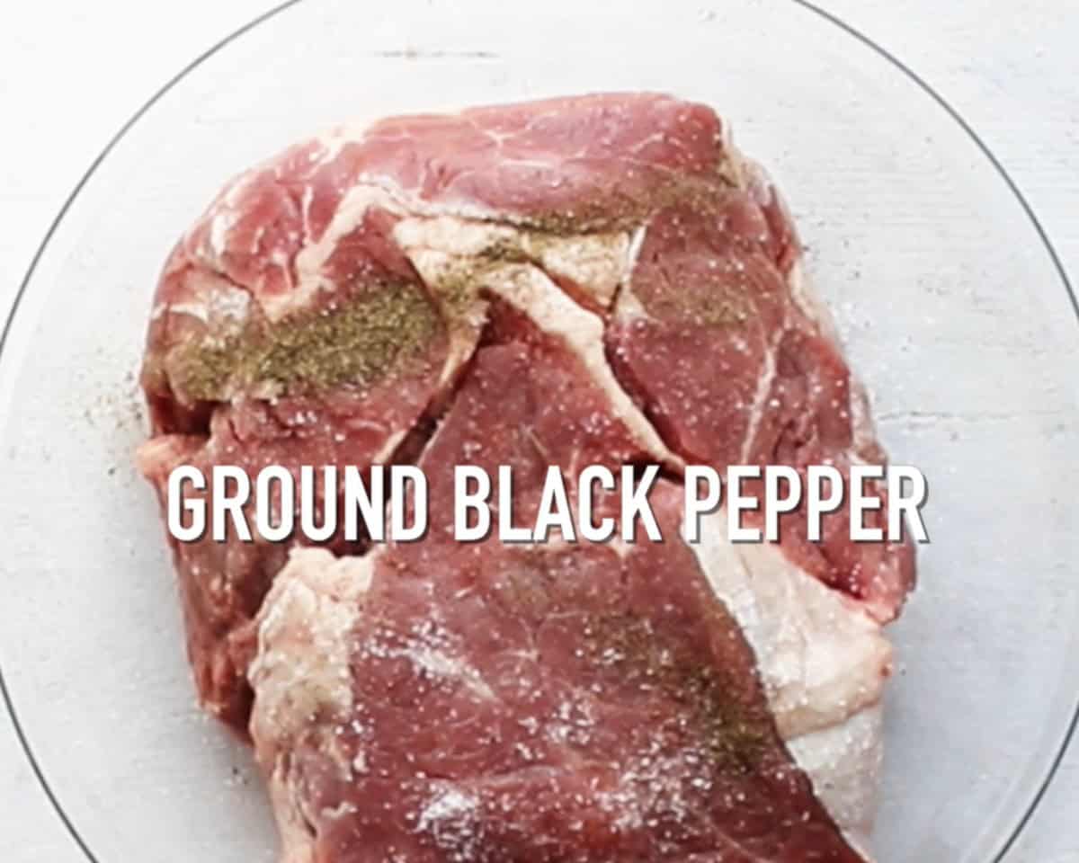 Seasoned beef in a glass bowl.