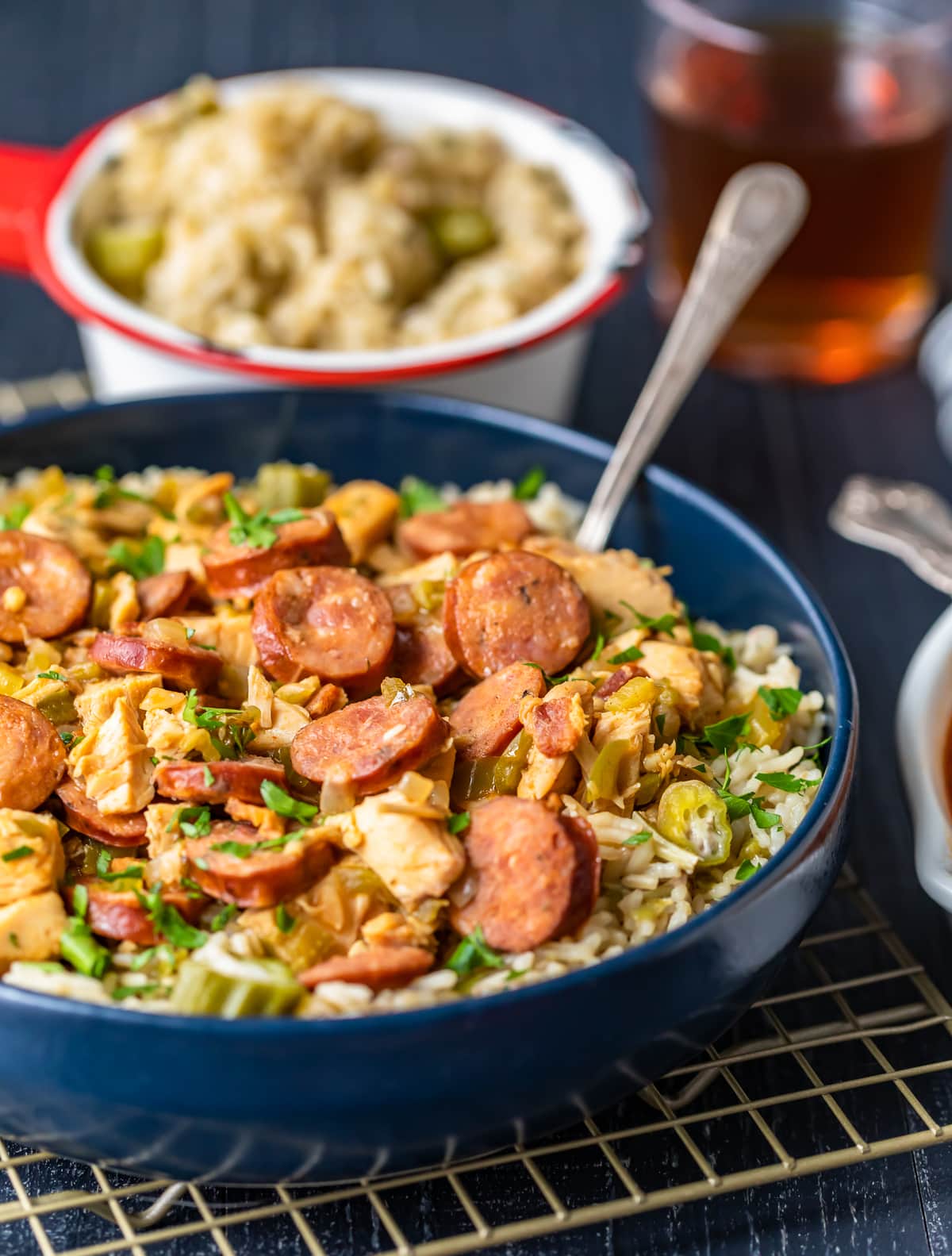a blue bowl filled with chicken and sausage gumbo