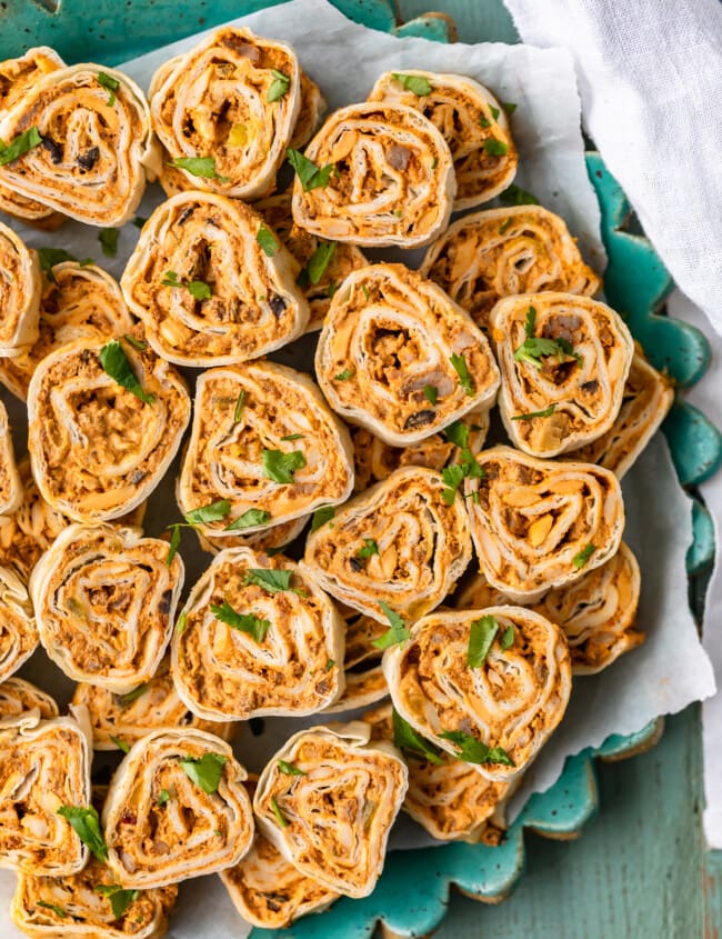 Mexican Pinwheels are a super simple and super tasty appetizer for any occasion. These Southwest Sausage Pinwheels are easy to make and require hardly any work at all. These sausage cream cheese pinwheels have all my favorite Mexican inspired flavor in one bite. Just as easy as any tortilla roll ups appetizer!