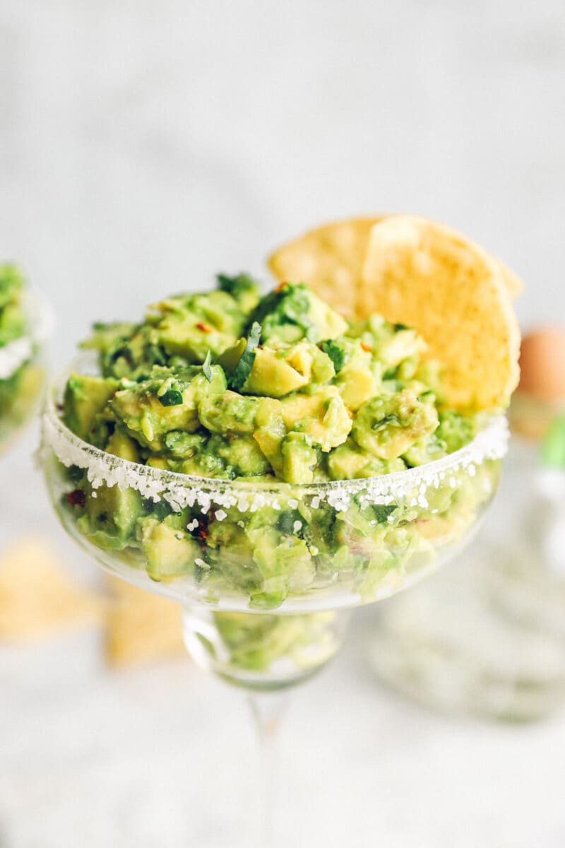 up close tequila margarita guacamole in margarita glass